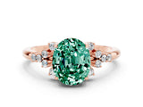 Rose gold Oval Cut Green Sapphire Ring with Side Stones and Four-Prong Setting_72