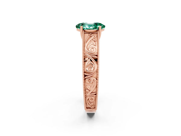 Rose gold Oval Cut Green Sapphire Solitaire Ring with Engraved Band and Four-Prong Setting