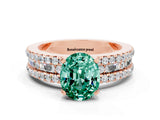 Rose gold Oval Cut Green Sapphire Solitaire Ring with Pavé and Channel Set Band