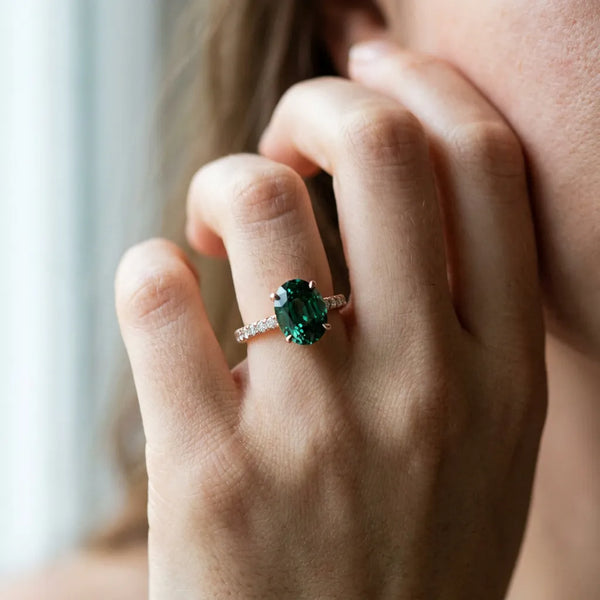 Rose gold Oval Cut Green Sapphire Solitaire Ring with Round  Pavé Band and Four-Prong Setting