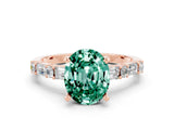 Rose gold Oval Cut Green Sapphire Solitaire with Side Baguettes and Channel Set Band