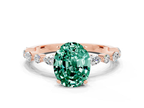 Rose gold Oval Cut Green Sapphire Solitaire with Side Stones on a Pavé Band and Four-Prong Setting