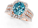 Rose gold Oval Cut Halo Blue Topaz Ring with Split Shank and Four-Prong Setting_1