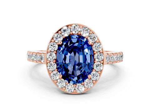 Rose gold Oval Cut Halo Diamond Ring with Pavé Band and Three-Prong Setting