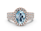 Rose gold Oval Cut Halo Pavé Diamond Engagement Ring with Split Shank and Four-Prong Setting