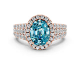 Rose gold Oval Cut Halo Pavé Diamond Engagement Ring with Split Shank and Four-Prong Setting