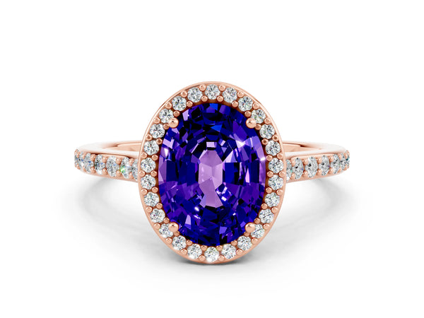 Rose gold Oval Cut Tanzanite Halo Engagement Ring with Round Pavé Shoulders and Prong Setting