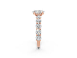 Rose gold Oval Cut Moissanite Prong Setting with Side Stones on a Pave Band_2