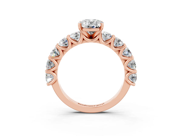 Rose gold Oval Cut Moissanite Prong Setting with Side Stones on a Pave Band