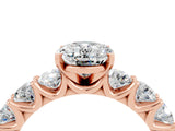 Rose gold Oval Cut Moissanite Prong Setting with Side Stones on a Pave Band_4