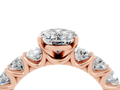Rose gold Oval Cut Moissanite Prong Setting with Side Stones on a Pave Band_4