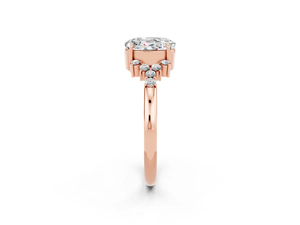 Rose gold Oval Cut Moissanite Ring with Side Stones and Four-Prong Setting