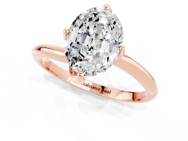 Rose gold Oval Cut Moissanite Solitaire Engagement Ring with Four-Prong Setting and Classic Band