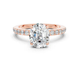 Rose gold Oval Cut Moissanite Solitaire Engagement Ring with Pavé Band and Four-Prong Setting