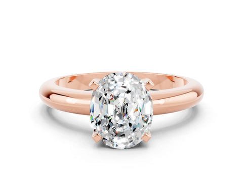 Rose gold Oval Cut Moissanite Solitaire Engagement Ring with Round Band and Four-Prong Setting