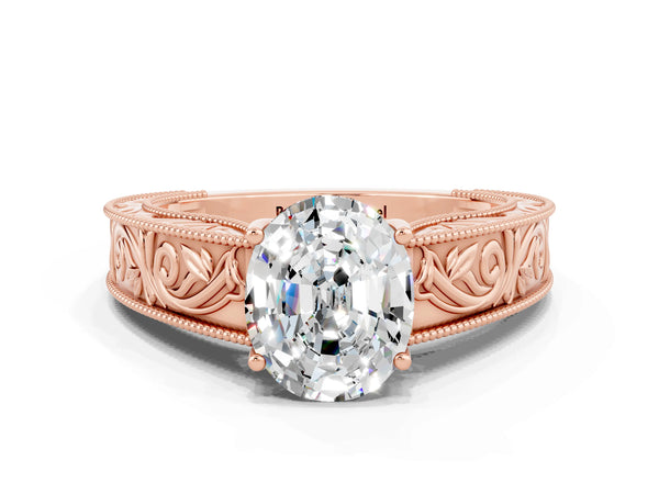 Rose gold Oval Cut Moissanite Solitaire Ring with Engraved Band and Four-Prong Setting