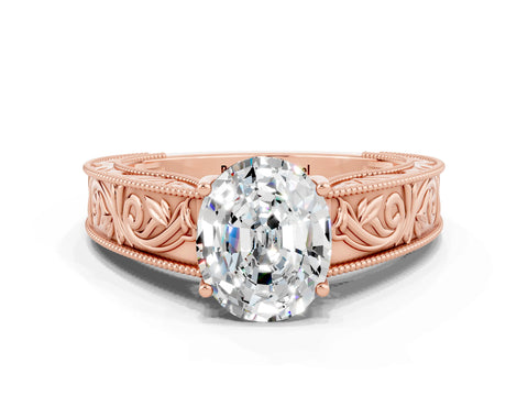 Rose gold Oval Cut Moissanite Solitaire Ring with Engraved Band and Four-Prong Setting