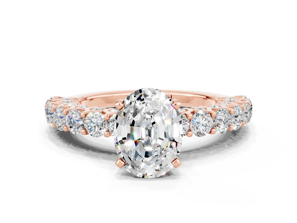Rose gold Oval Cut Moissanite Solitaire Ring with Shared Prong Pavé Band and Four-Prong Setting