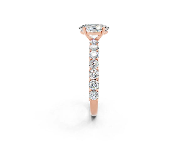 Rose gold Oval Cut Moissanite Solitaire Ring with Shared Prong Pavé Band and Four-Prong Setting