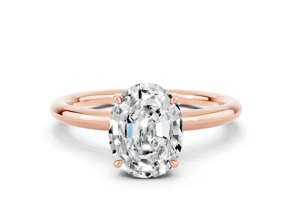 Rose gold Oval Cut Moissanite Solitaire Ring with Thin Band and Four-Prong Setting