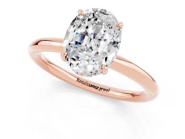 Rose gold Oval Cut Moissanite Solitaire Ring with Thin Band and Four-Prong Setting