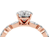Rose gold Oval Cut Moissanite Solitaire with Side Stones on a Pavé Band and Four-Prong Setting_4