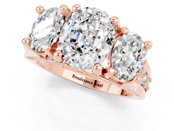 Rose gold Oval Cut Moissanite Three-Stone Ring with Channel Set Band and Four-Prong Setting
