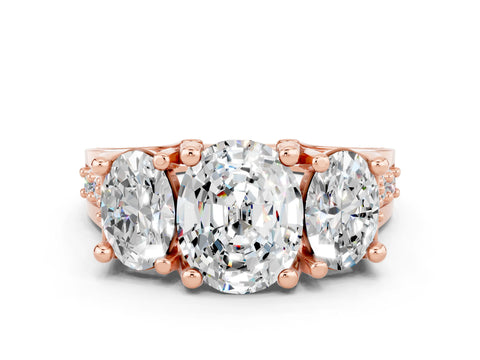 Rose gold Oval Cut Moissanite Three-Stone Ring with Channel Set Band and Four-Prong Setting