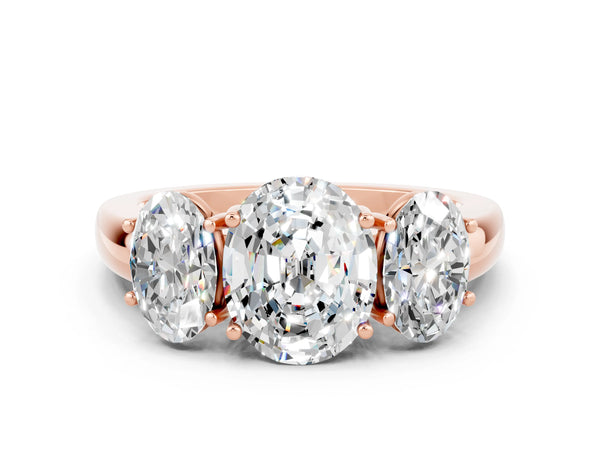 Rose gold Oval Cut Moissanite Three-Stone Ring with Four-Prong Setting and Classic Band