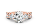 Rose gold Oval Cut Moissanite Three-Stone Ring with Pavé Split Shank and Four-Prong Setting_12