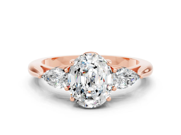 Rose gold Oval Cut Moissanite Three-Stone Ring with Pear  Side Stones and Prong Setting