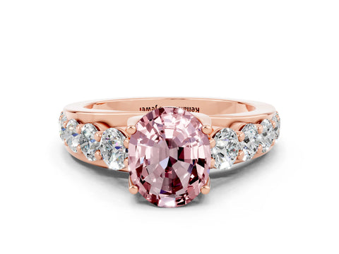Rose gold Oval Cut Morganite Engagement Ring with Pavé Band and Four-Prong Setting