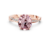 Rose gold Oval Cut Morganite Engagement Ring with Side Stone Accents and Four-Prong Setting_27