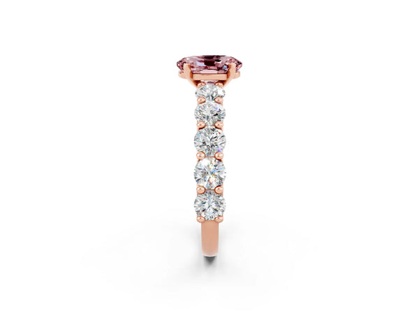 Rose gold Oval Cut Morganite Prong Setting with Side Stones on a Pave Band