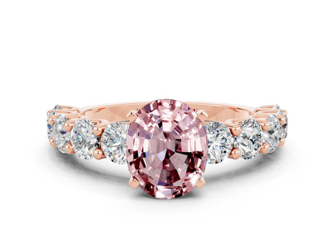 Rose gold Oval Cut Morganite Prong Setting with Side Stones on a Pave Band