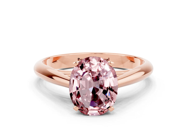 Rose gold Oval Cut Morganite Solitaire Engagement Ring with Cathedral Setting and Four-Prong Mount