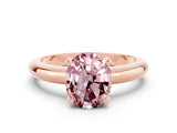 Rose gold Oval Cut Morganite Solitaire Engagement Ring with Round Band and Four-Prong Setting
