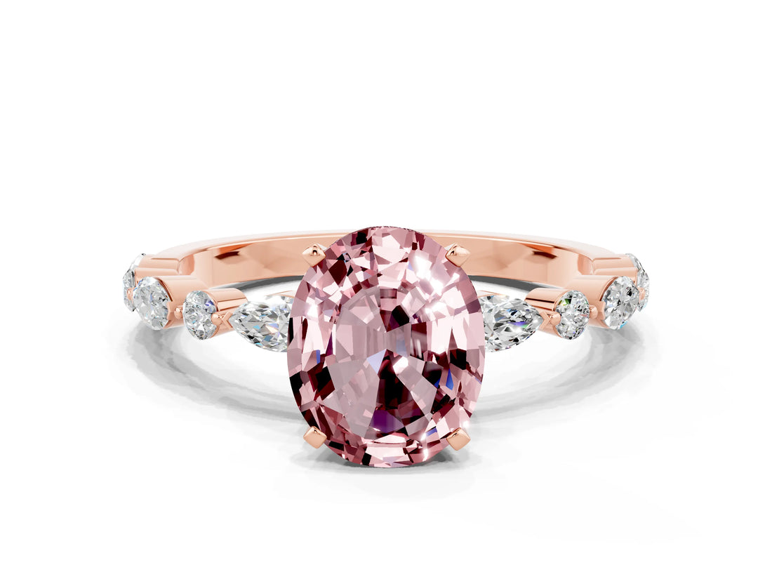 Rose gold Oval Cut Morganite Solitaire with Side Stones on a Pavé Band and Four-Prong Setting