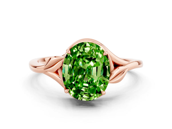 Rose gold Oval Cut Peridot Solitaire Ring with Twist Band and Four-Prong Setting