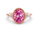 Rose gold Oval Cut Pink Sapphire Halo Ring with Tapered Band and Four-Prong Setting