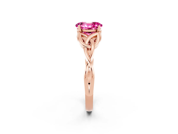 Rose gold Oval Cut Pink Sapphire Solitaire Engagement Ring with Celtic Knot Band and Four-Prong Setting