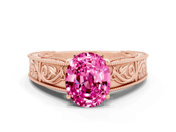 Rose gold Oval Cut Pink Sapphire Solitaire Ring with Engraved Band and Four-Prong Setting