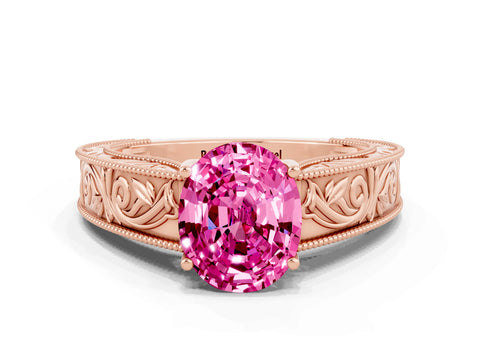 Rose gold Oval Cut Pink Sapphire Solitaire Ring with Engraved Band and Four-Prong Setting