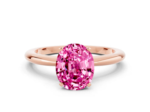 Rose gold Oval Cut Pink Sapphire Solitaire Ring with Six-Prong Setting and Classic Band
