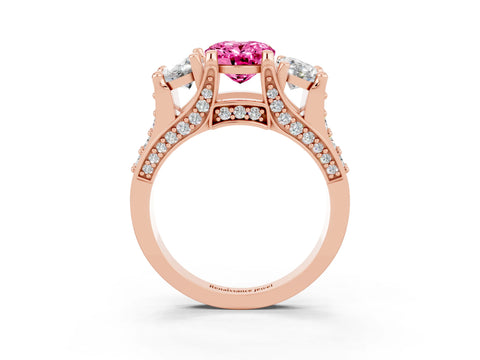 Rose gold Oval Cut Pink Sapphire Three-Stone Ring with Channel Set Band and Four-Prong Setting_3