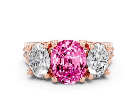 Rose gold Oval Cut Pink Sapphire Three-Stone Ring with Channel Set Band and Four-Prong Setting