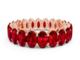 Rose gold Oval Cut Ruby Eternity Band with Shared Prong Setting