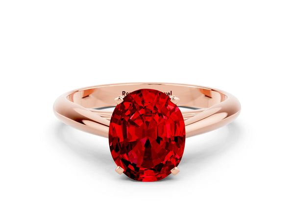 Rose gold Oval Cut Ruby Solitaire Engagement Ring with Cathedral Setting and Four-Prong Mount