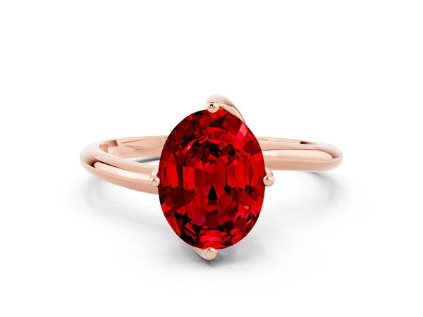 Rose gold Oval Cut Ruby Solitaire Engagement Ring with Four-Prong Setting and Classic Band