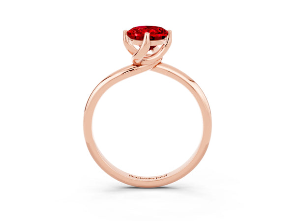 Rose gold Oval Cut Ruby Solitaire Engagement Ring with Four-Prong Setting and Classic Band